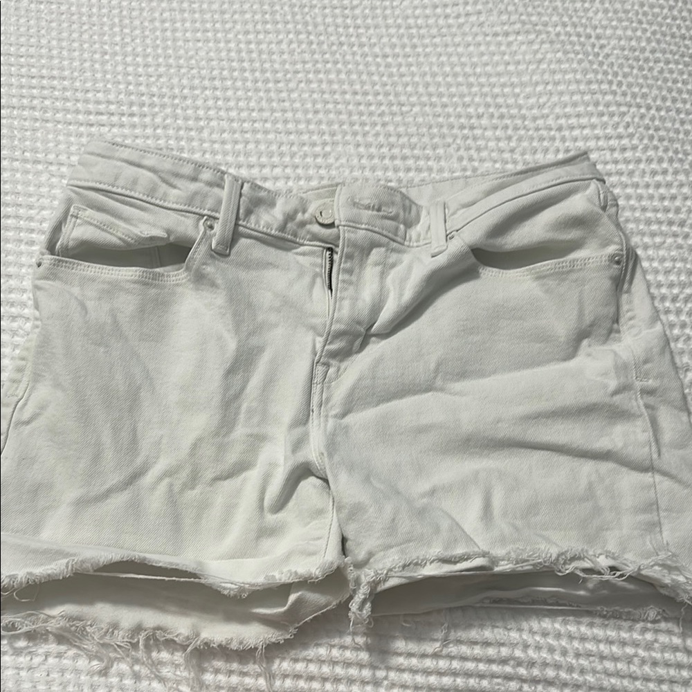 Levi's White Jean Shorts Distressed Raw Hem size 30